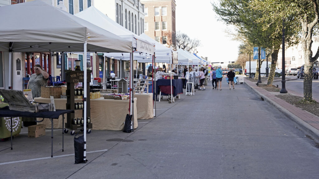 Vendors and booths set up before the start of First Friday