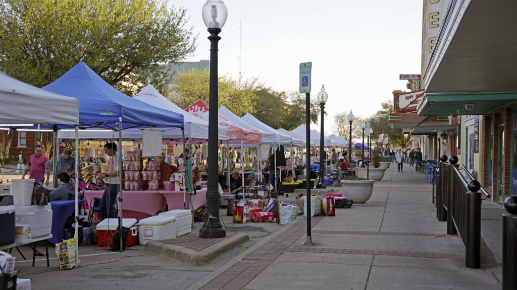 Booths at First Friday in Downtown Bryan