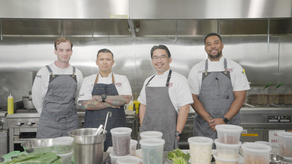 Aggie Chef Showdown chefs pose for a group photo.