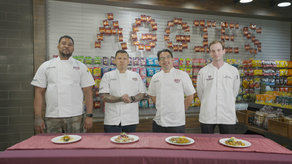 All Aggie Chef Showdown chefs pose with their finished dishes.