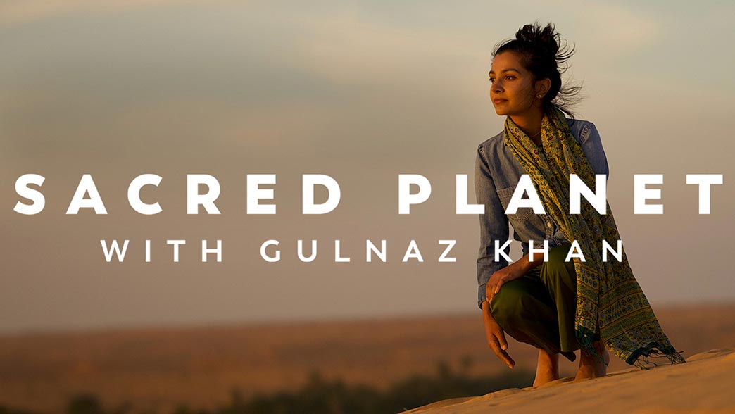 text reading "Sacred Planet with Gulnaz Khan" over a background image of a woman in a desert